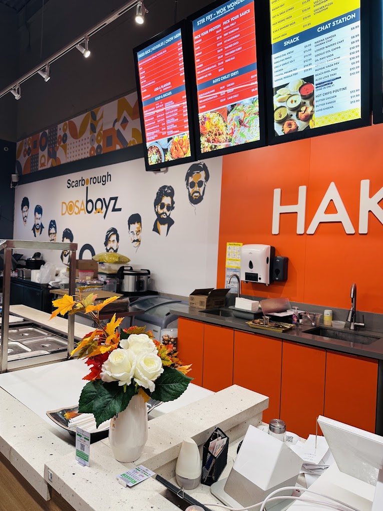 The counter and menu boards inside Dosa Boyz / Hakka Boyz on Kennedy Road